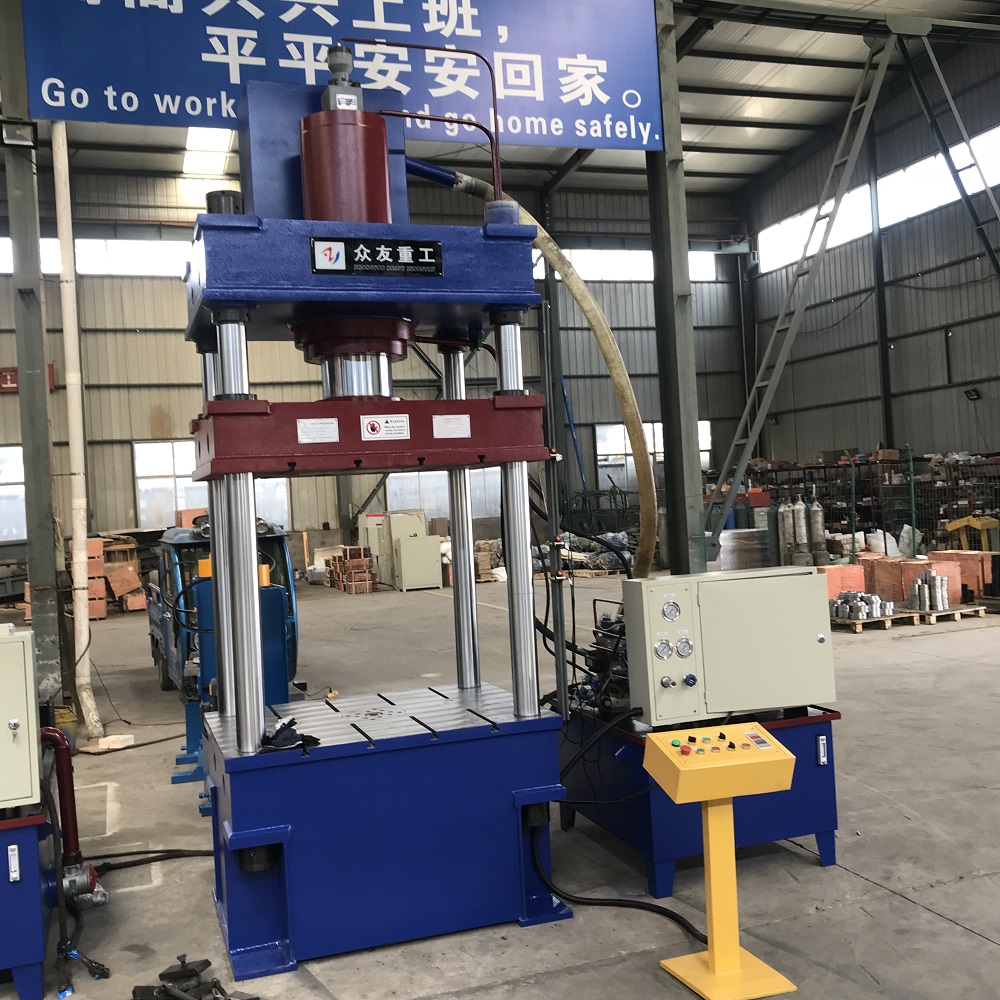 315噸(dun)三(san)樑四(si)柱灰(hui)鬭車拉伸(shen)成型(xing)切(qie)邊液壓機(ji)
